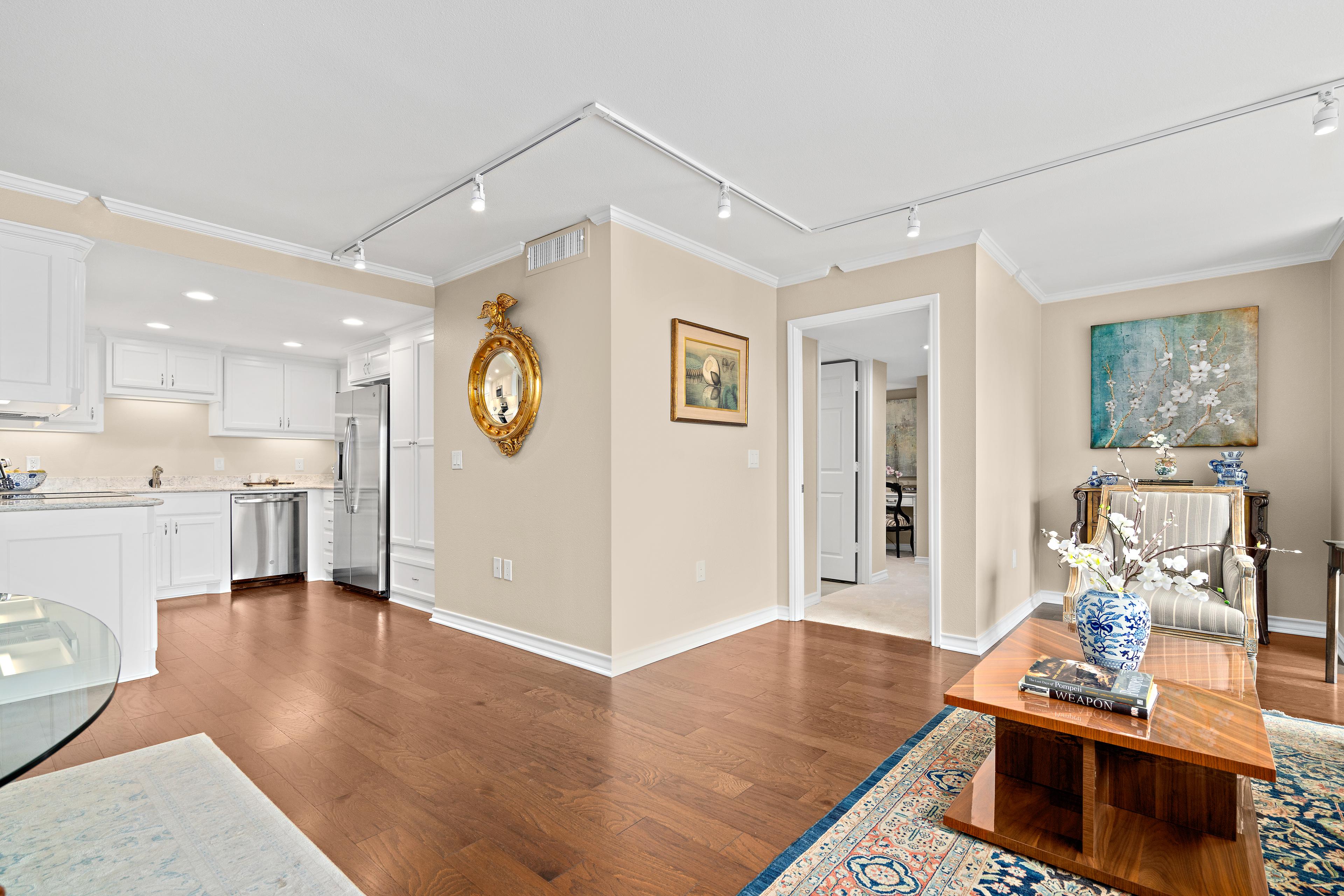 Photo of a living area and kitchen from the Carter floor plan.