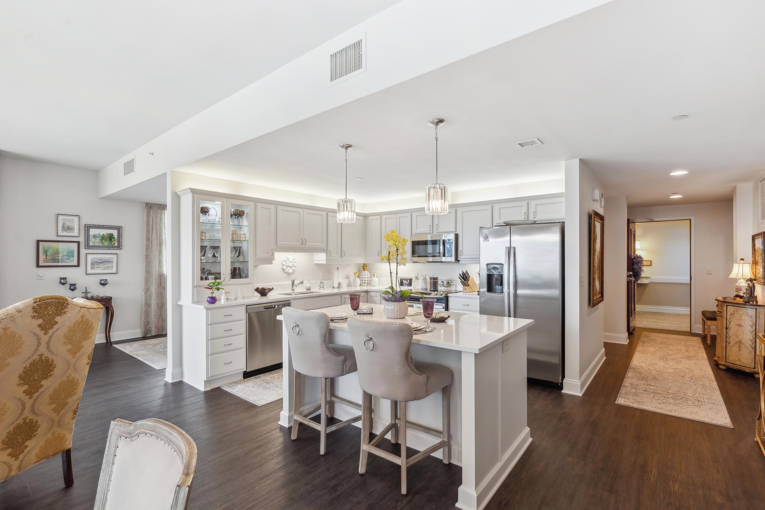 Photo of a kitchen and entryway from the Forest floor plan.