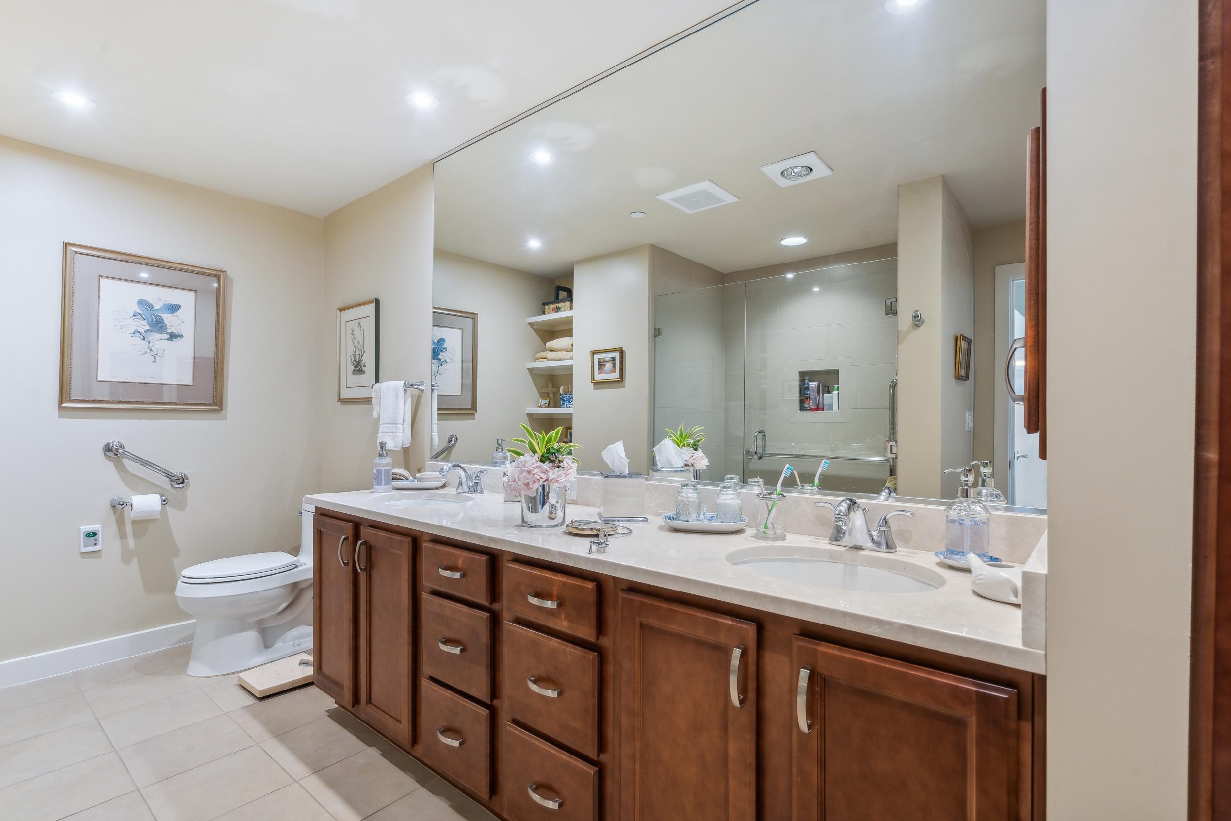 A bathroom with two sinks in the Nolan floorplan.