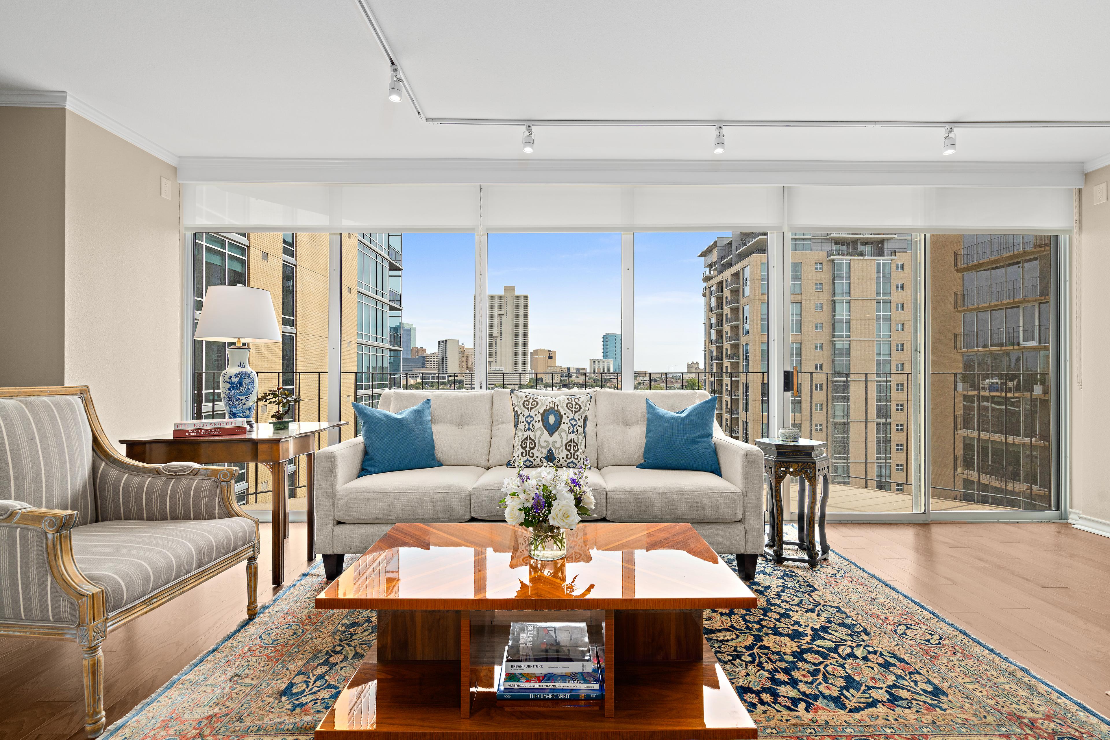 A living space with large windows at Trinity Terrace.